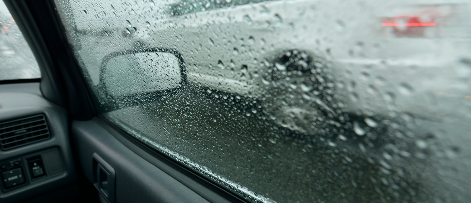 Car driving through dangerous weather